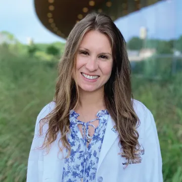 Headshot of Kristina Rossmiller outdoors.